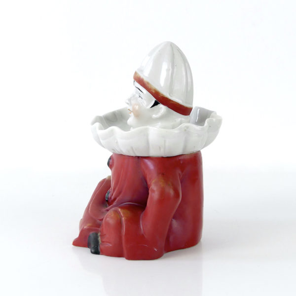 Ancien presse citron Clown complet en porcelaine et biscuit (profil)