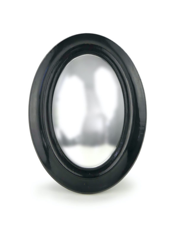Petit miroir oval bombé œil de sorcière en bois noir XIXe (face)