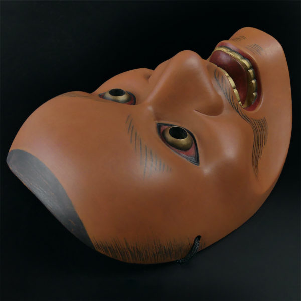 Masque Kotobide en bois de cyprès et sac en soie brocart Japon Shōwa (dessus 3/4)