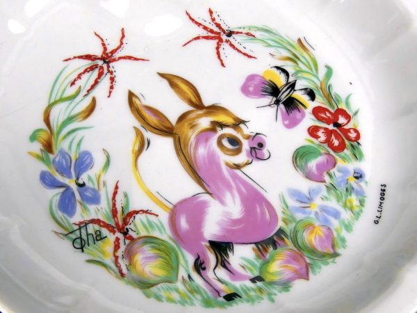 Petite assiette chauffante ancienne en porcelaine de Limoges (détail)