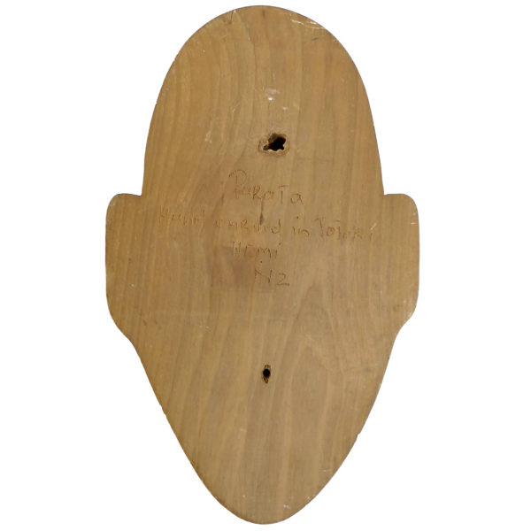 Petit masque Parata Māori signé Hemi en bois de Tōtara et Pāua (dos)