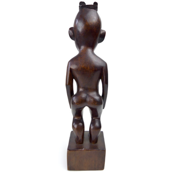 Petit Teko Teko Poutokomanawa Māori en bois brun Nouvelle-Zélande (dos)