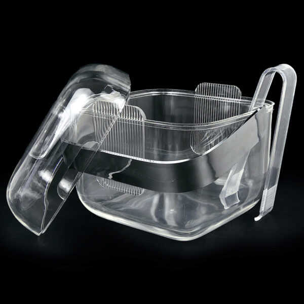 Bac à glaçons Guzzini en plastique transparent et sa pince Space Age 70 (ouvert 3/4)