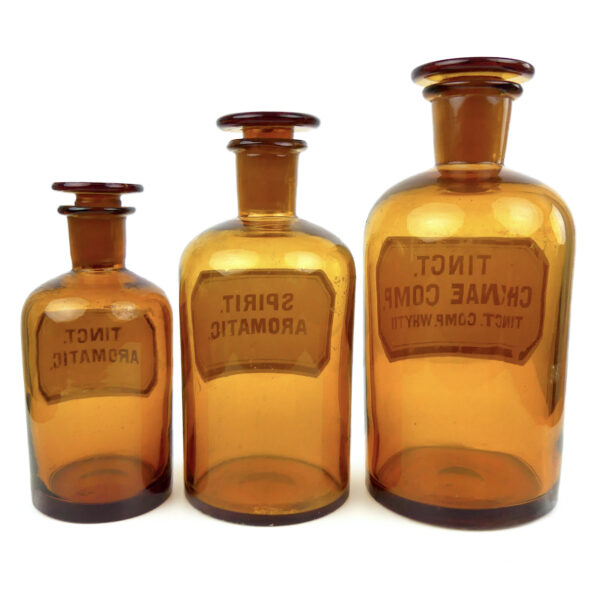 3 flacons anciens de pharmacie apothicaire en verre fumé orange foncé (dos)