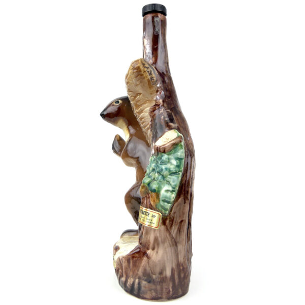 Bouteille écureuil à liqueur Garnier en porcelaine Art populaire France (profil)