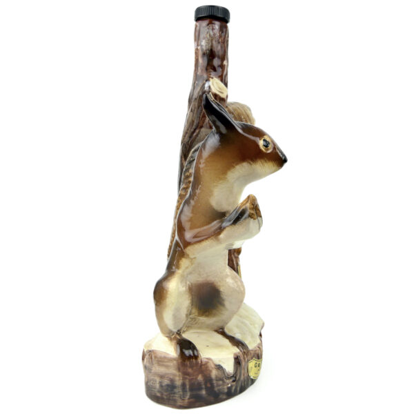 Bouteille écureuil à liqueur Garnier en porcelaine Art populaire France (profil)
